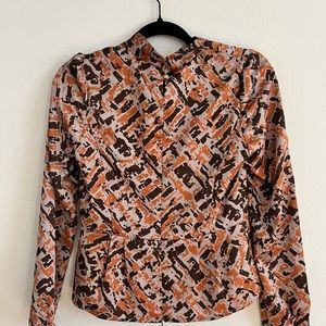 Orange brown printed top in size small